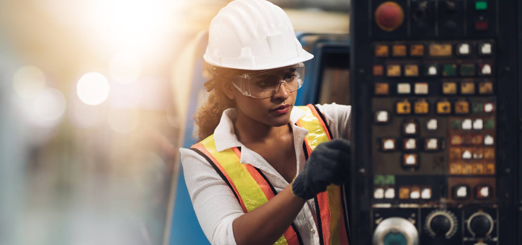 Female professional engineering worker with hardhat