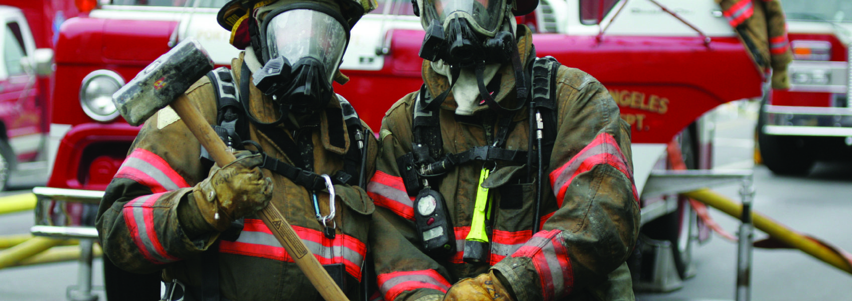 firefighters with ax in hand