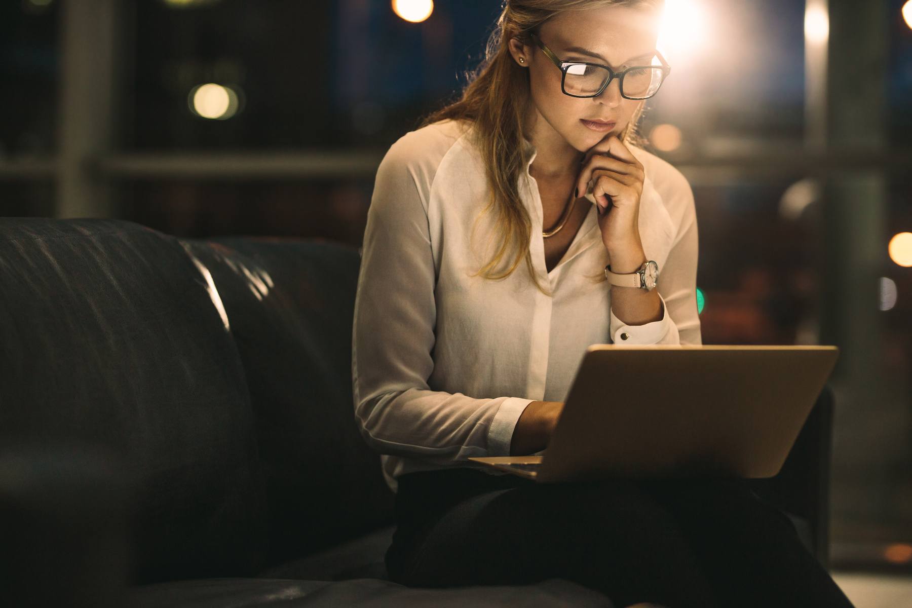 Woman looking at her laptop