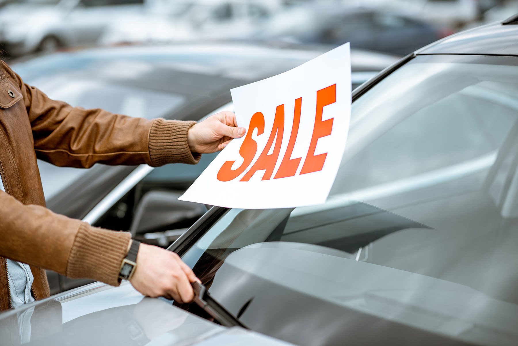 sale sign in used car lot