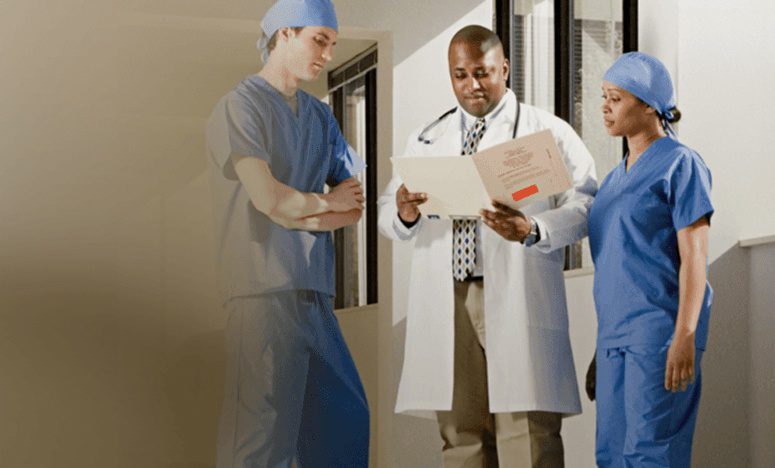 doctors going over patient charts
