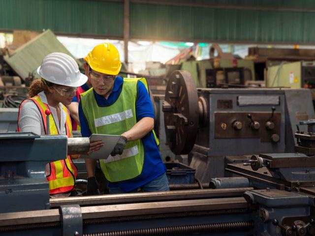 Workers looking at plans