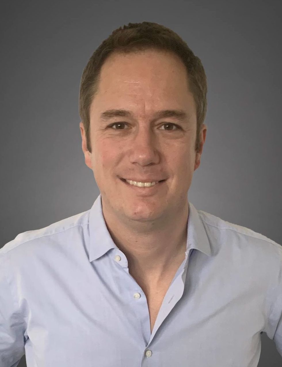 headshot of klaus woeste