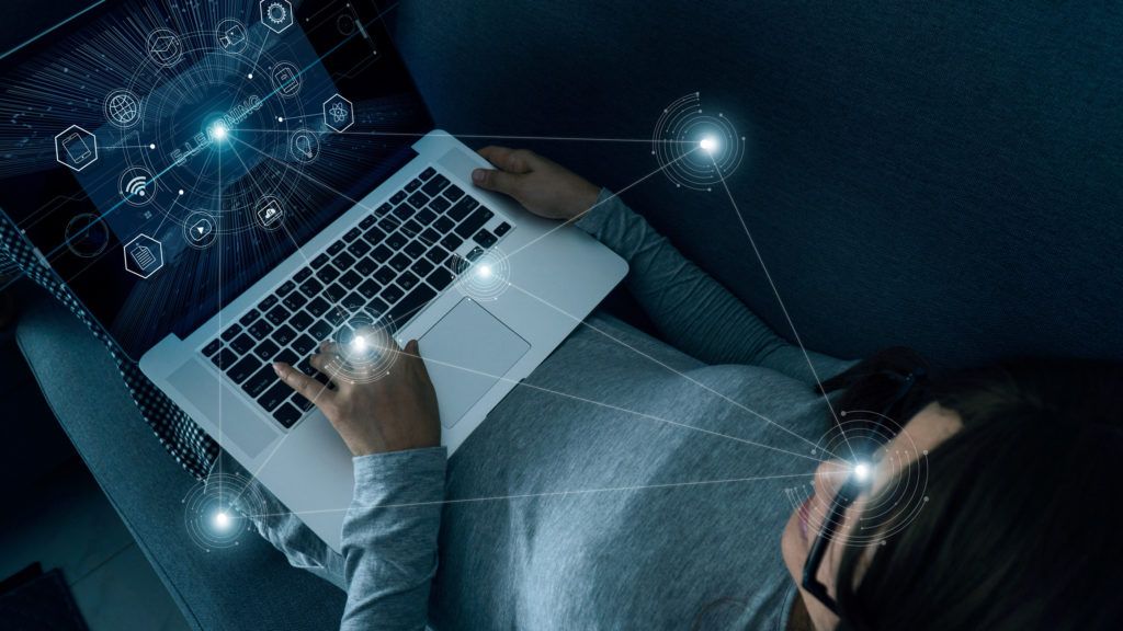 E-Learning with abstract woman using a laptop