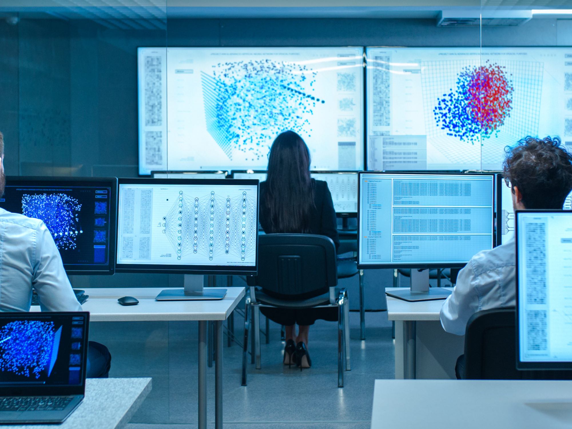 Team of Computer Engineers Work on Machine Learning Neural Network Technology Development.
