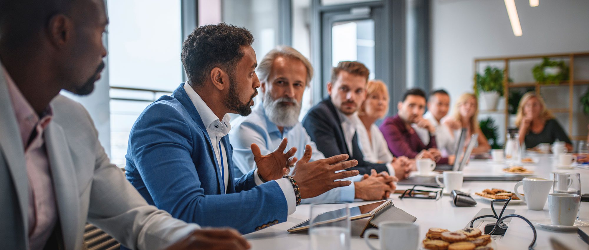 diverse business team sitting around a table