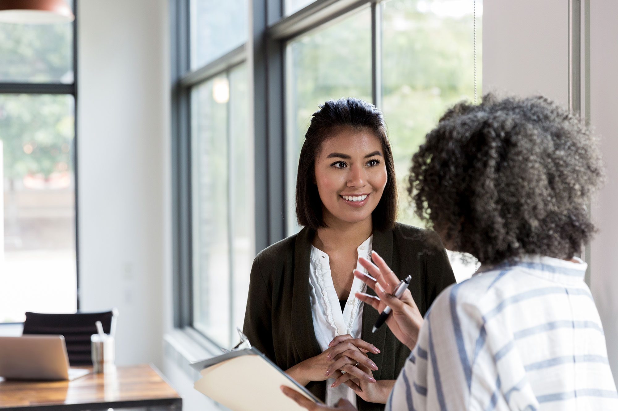 two business women in conversation